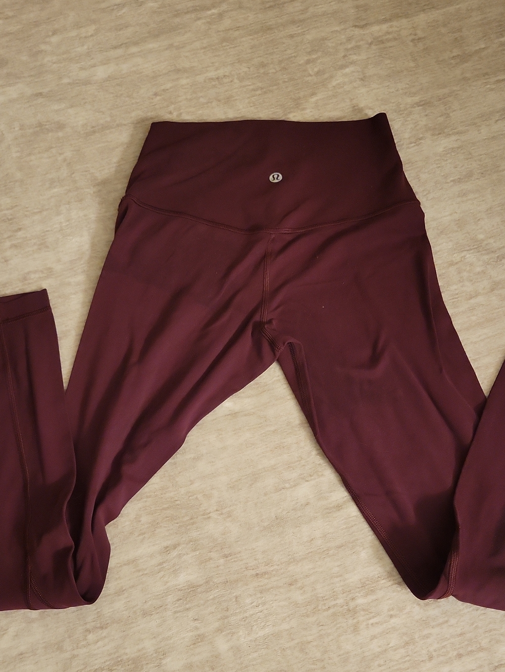 lululemon athletica High-Rise Wine Leggings.  Staining on Back From Sweatshirt.